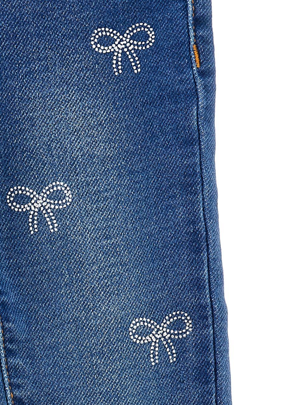 Jeans dritti per neonata Monnalisa in denim con stampa con fiocco - Image 3