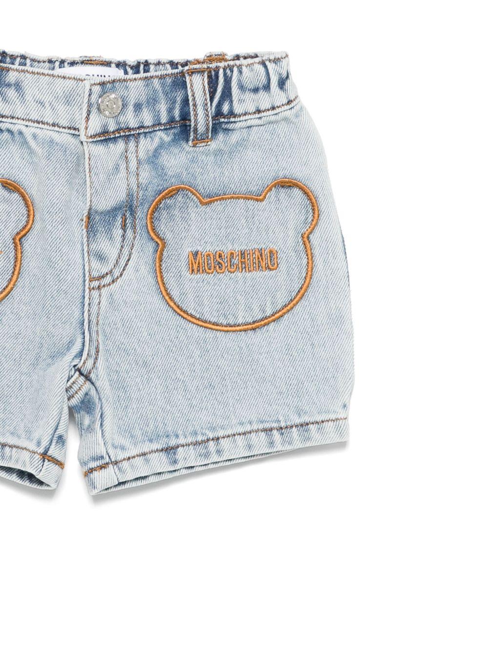 Pantaloncini con logo ricamato per neonata Moschino Kids azzurro con passanti per cintura - Image 3