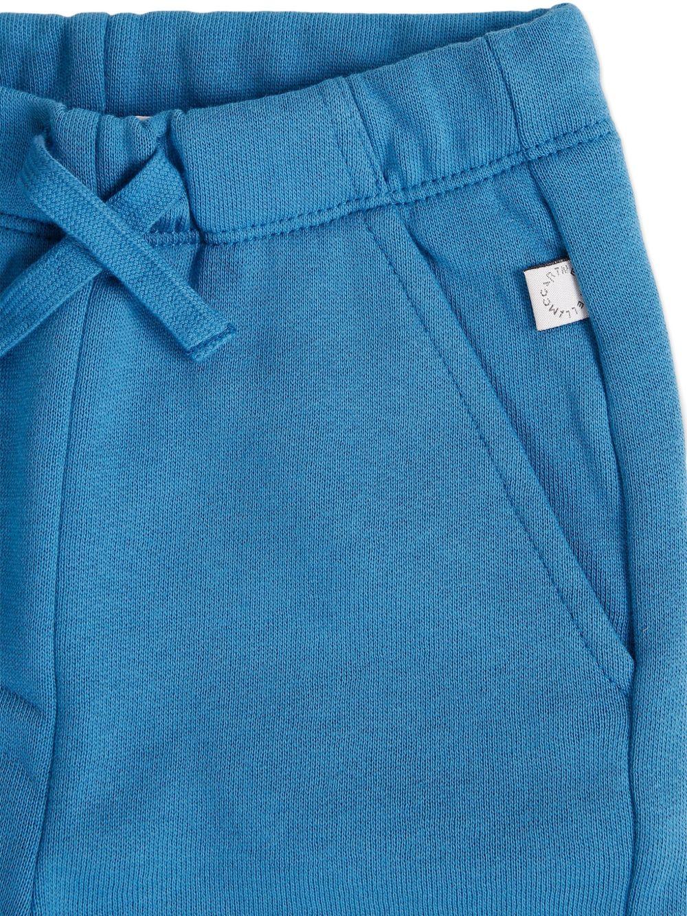 Pantaloni per neonato Stella McCartney Kids blu con stampa grafica - Image 3