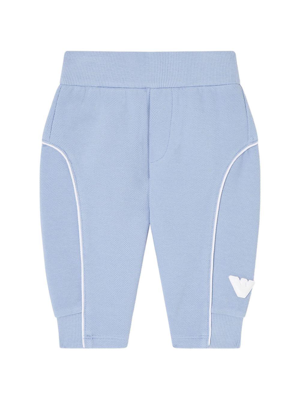 Pantaloni sportivi per neonato Emporio Armani Kids azzurro con logo aquila sul davanti