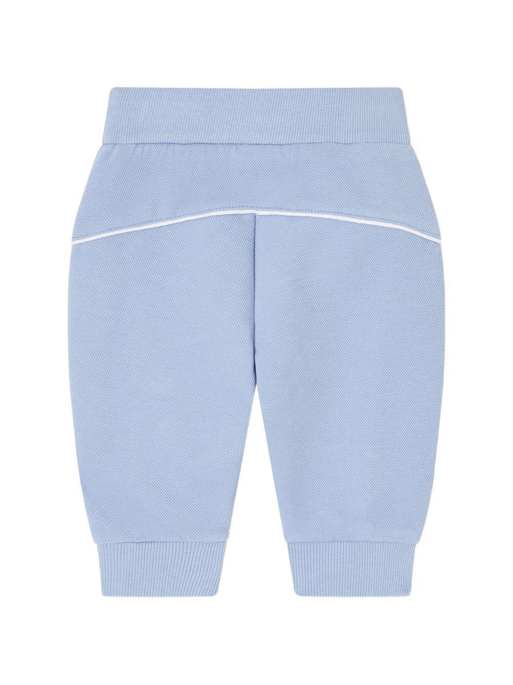 Pantaloni sportivi per neonato Emporio Armani Kids azzurro con logo aquila sul davanti - Image 2