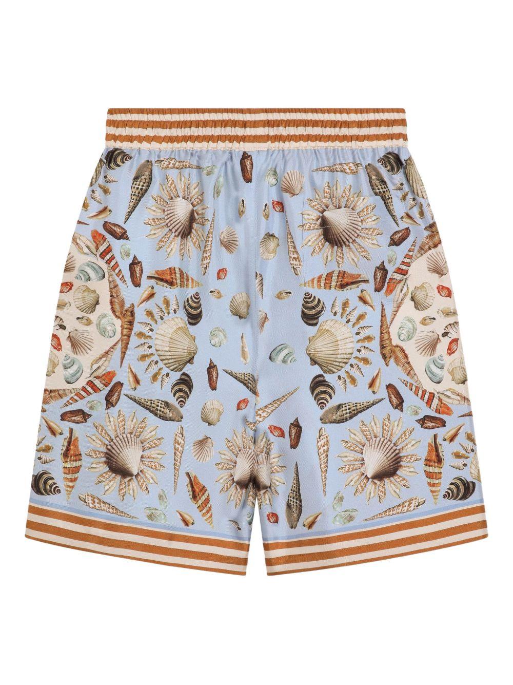 Shorts per bambino Dolce & Gabbana Kids azzurri con stampa grafica all-over - Image 2
